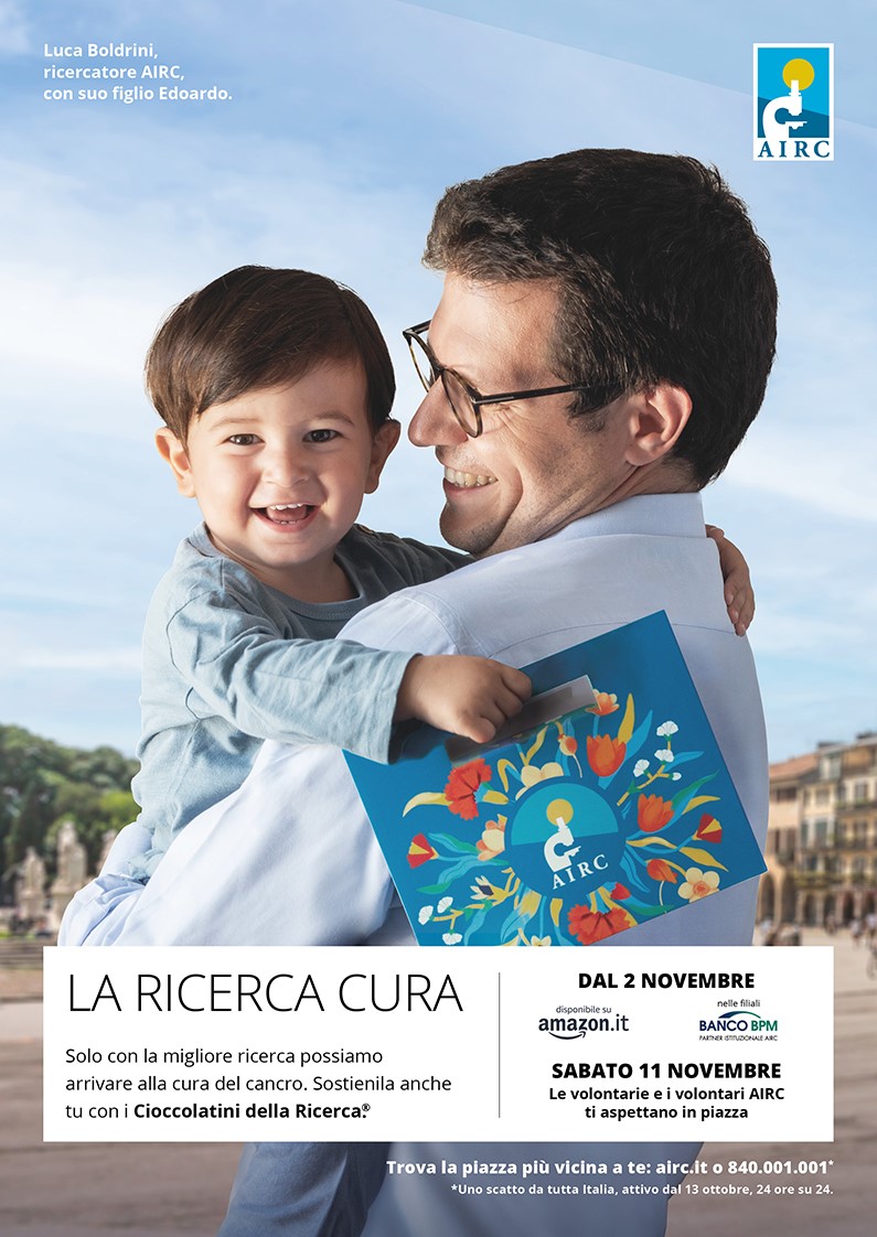 locandina dei cioccolatini della ricerca con lo scienziato Luca Boldrini e il figlio
